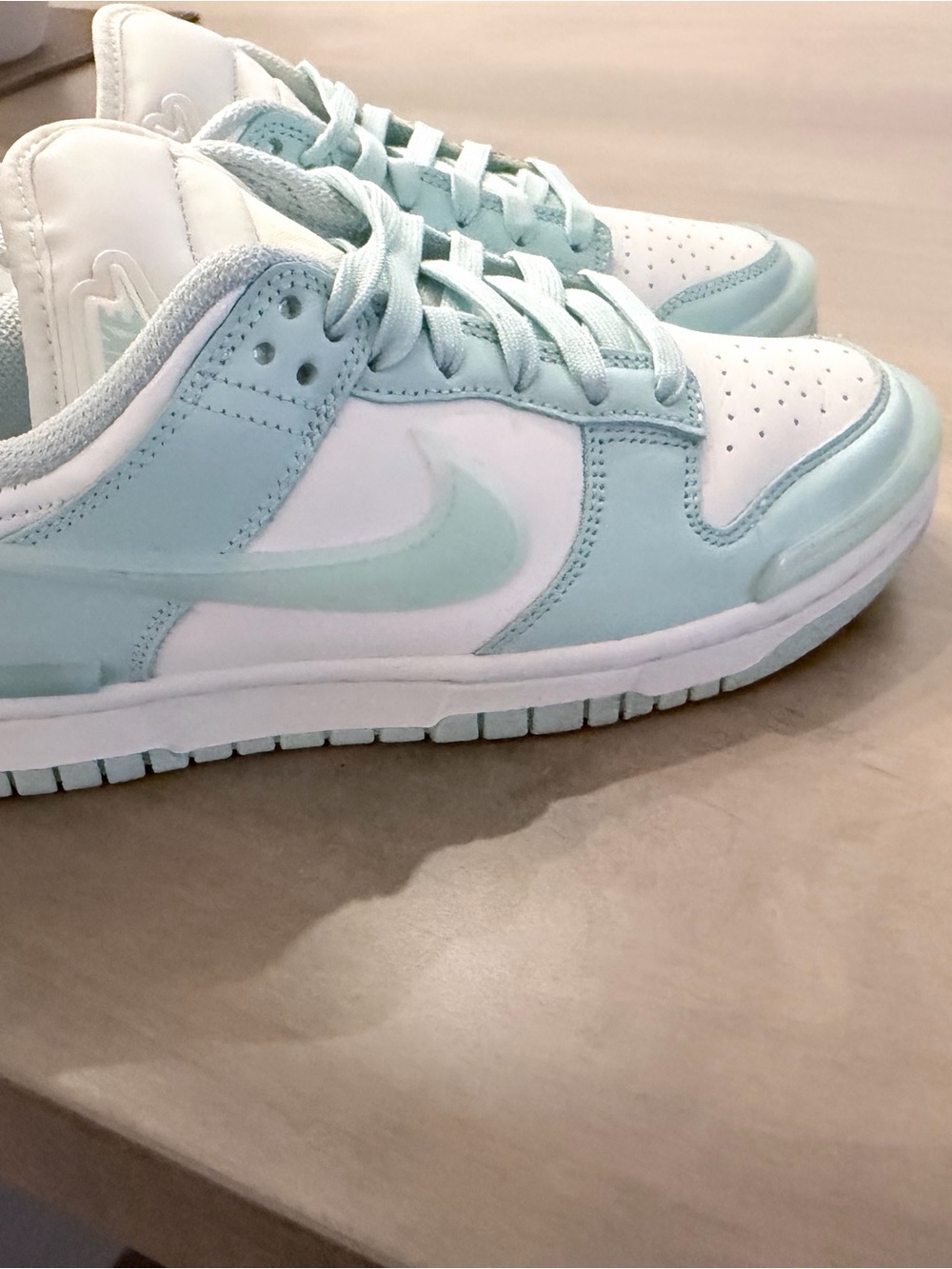 Nike Women’s Low-Top Sneakers in White and Light Blue